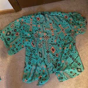 green shaw with geometric design